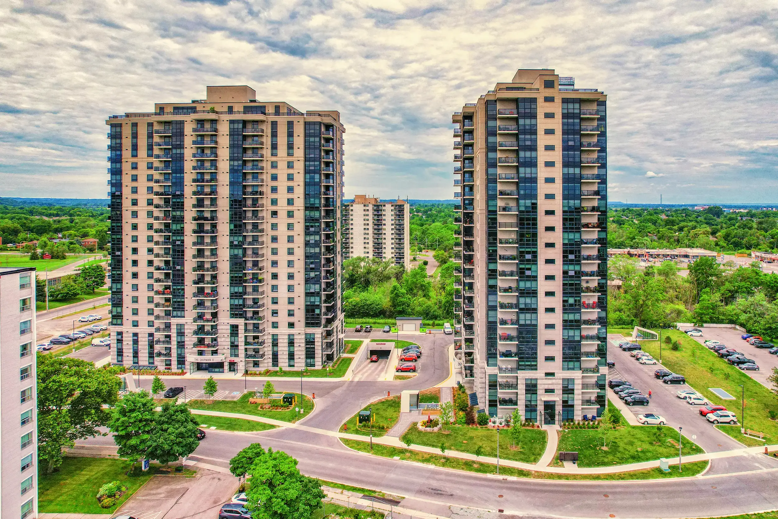 High-rise curtain wall and retrofit fenestration at Towering Heights Boulevard